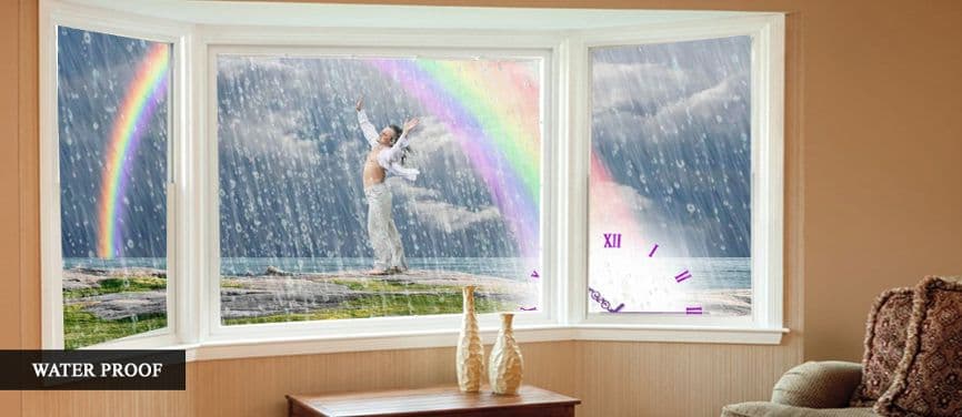 A waterproof bay window showcasing heavy rain, a rainbow, and a figure outside.